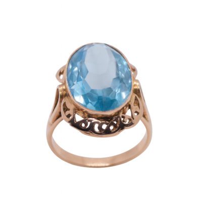 Złoty pierścionek z niebieskim kamieniem