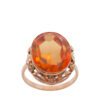 Złoty pierścionek z pomarańczowym kamieniem