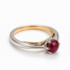 Złoty pierścionek z diamentami i rubinem 1,04 ct