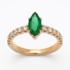 Złoty pierścionek z diamentami i szmaragdem 0,42 ct
